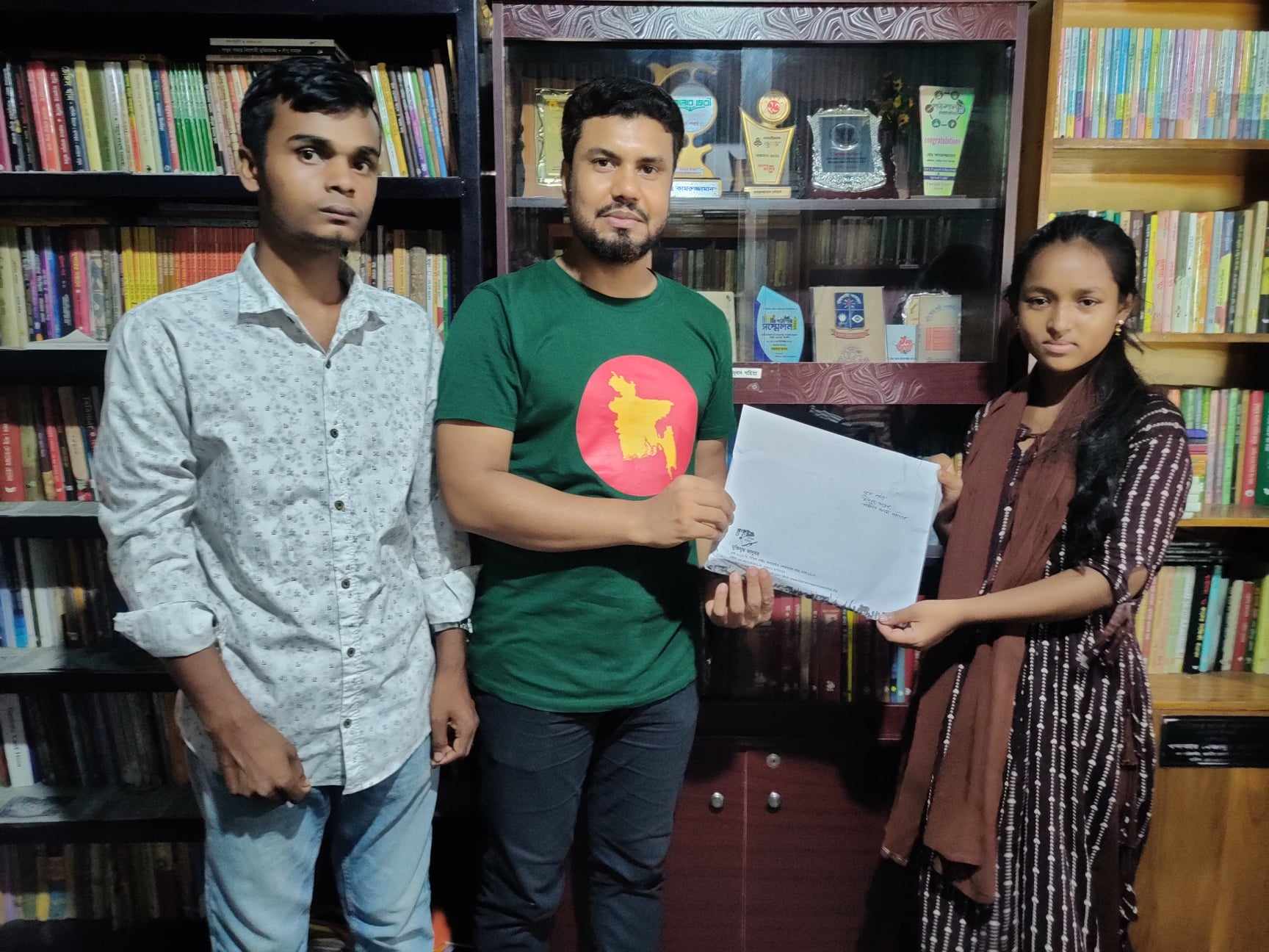 Distribution of Certificates and Prizes of Book Reading Competition in Tangail