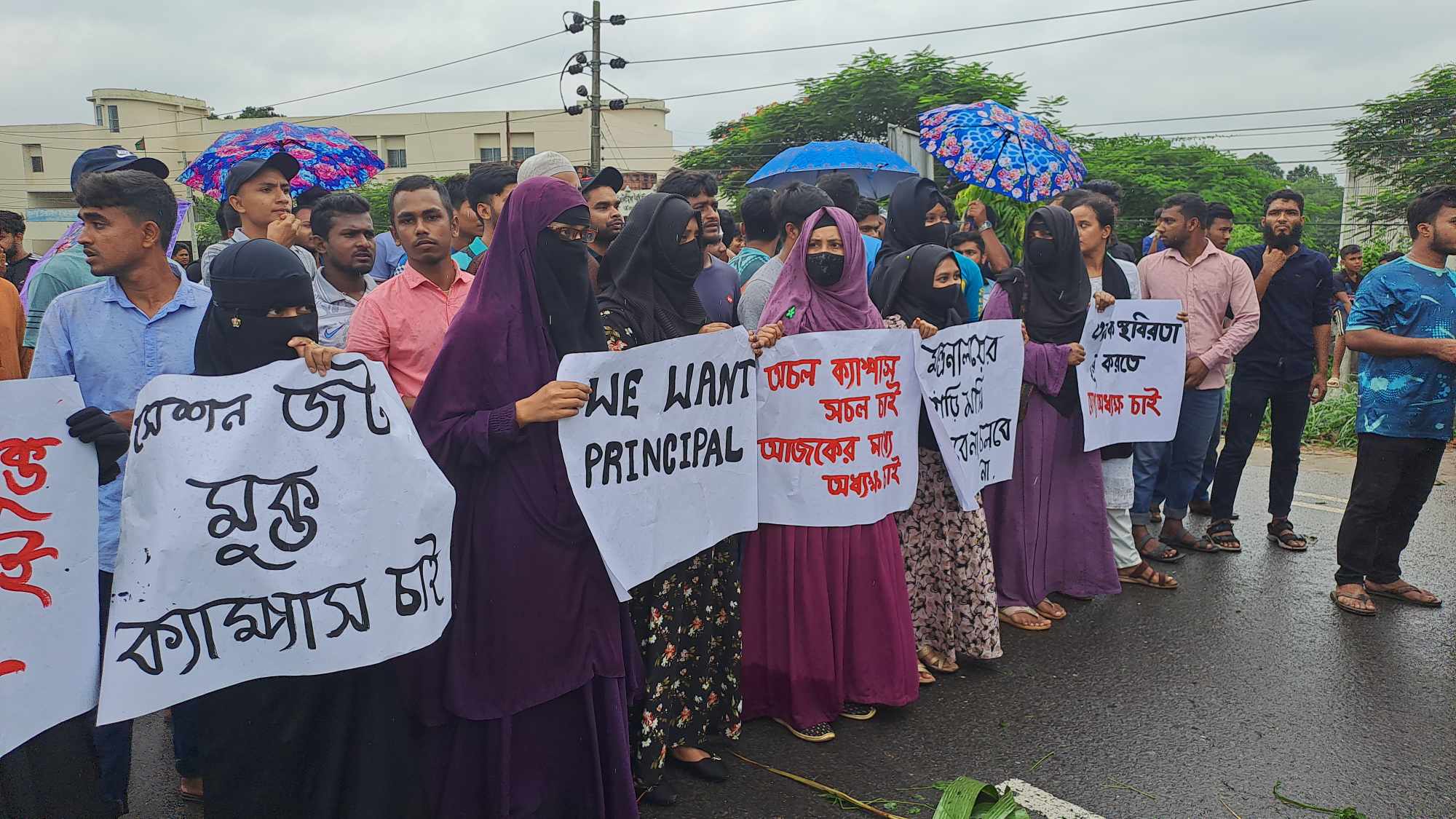 Students of Bangabandhu Textile Engineering College block the highway demanding appointment of principal.