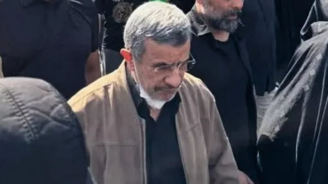 Ahmadinejad at Khamenei's funeral, dismissing rumors of death
